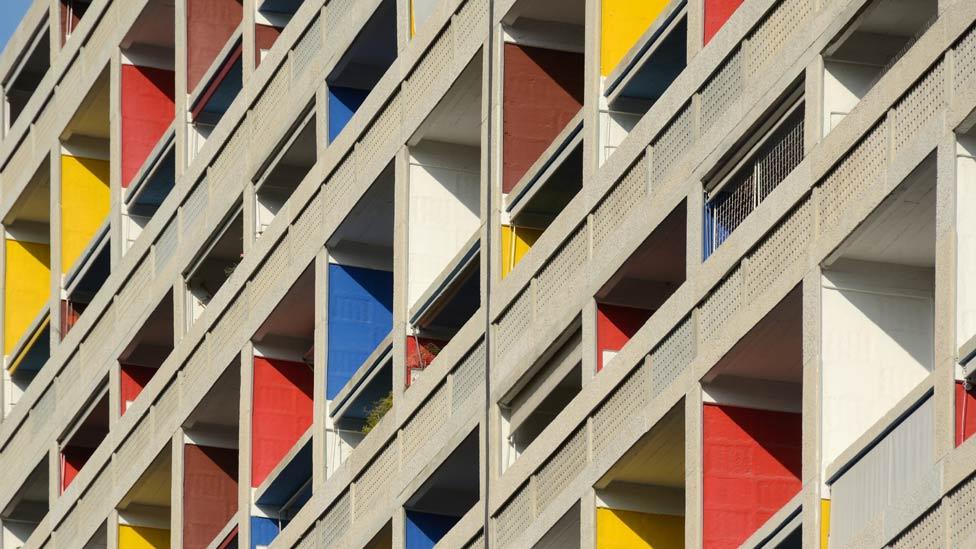 Each living unit was designed as an autonomous space, with double-height living rooms and deep balconies in bright colours contrasting with the plain concrete facade. (Corbis) Each living unit was designed as an autonomous space, with double-height living rooms and deep balconies in bright colours contrasting with the plain concrete facade. (Corbis)