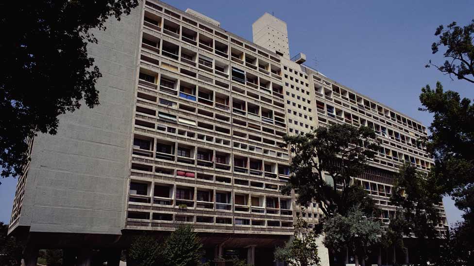 The 337 apartments are arranged over 12 storeys. Le Corbusier likened the frame of L'Unité to a wine rack in which individual units functioned as the bottles. (Corbis) The 337 apartments are arranged over 12 storeys. Le Corbusier likened the frame of L'Unité to a wine rack in which individual units functioned as the bottles. (Corbis)