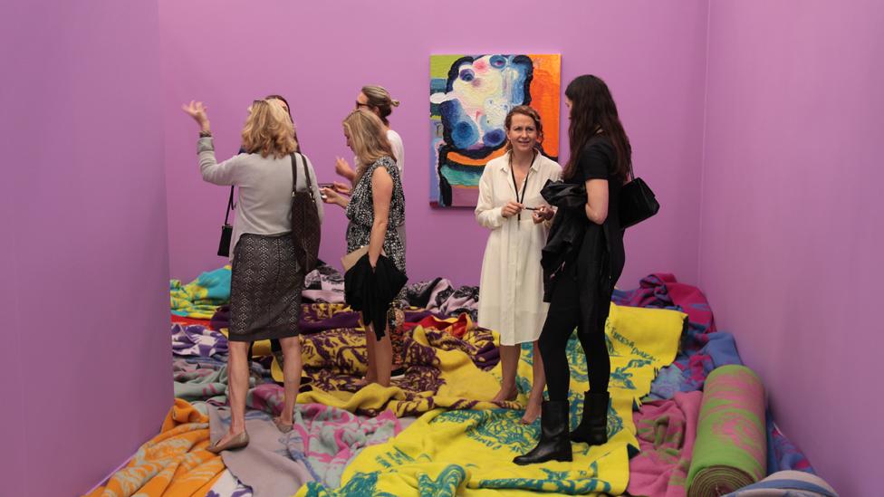 Visitors walk around inside an installation by Norwegian artist Bjarne Melgaard, exhibited by Gavin Brown's Enterprise. (John Berens/ Frieze) Visitors walk around inside an installation by Norwegian artist Bjarne Melgaard, exhibited by Gavin Brown's Enterprise. (John Berens/ Frieze)