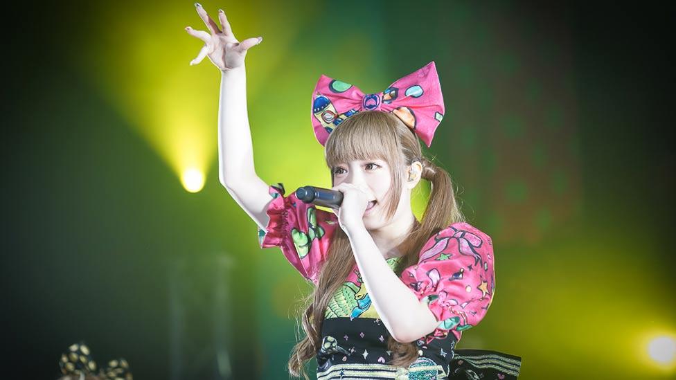 Kawaii appears in Japanese fashion such as the ‘Lolita’ trend, which features ribbons, bows and parasols to create a doll-like appearance. (Asobi System) Kawaii appears in Japanese fashion such as the ‘Lolita’ trend, which features ribbons, bows and parasols to create a doll-like appearance. (Asobi System)