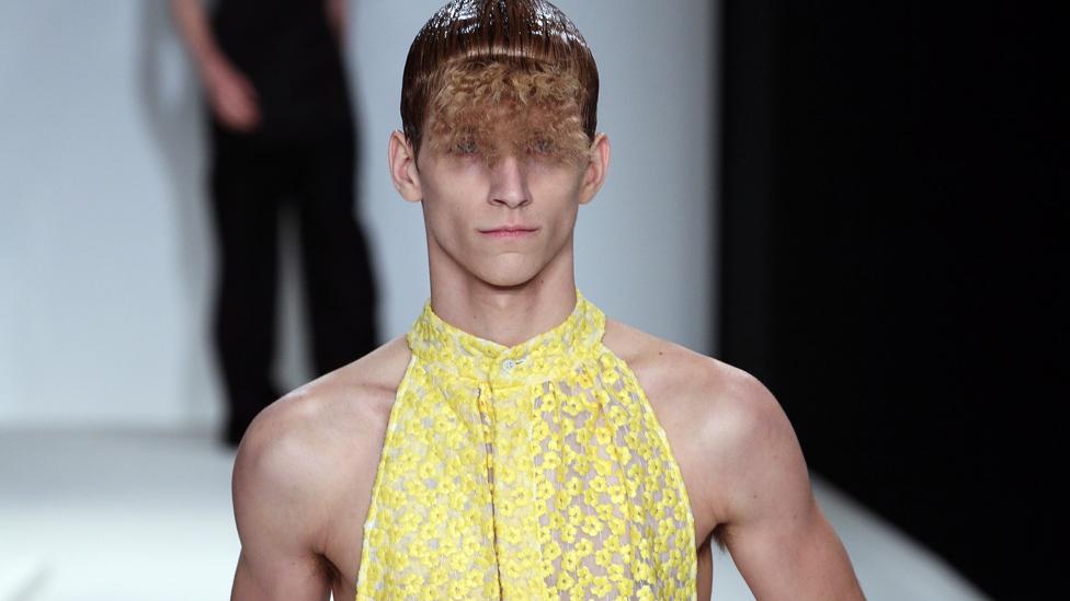 JW Anderson's backless, semi-sheer halter tops for men raised eyebrows at London Men's Fashion Week. (Rex Features) JW Anderson's backless, semi-sheer halter tops for men raised eyebrows at London Men's Fashion Week. (Rex Features)