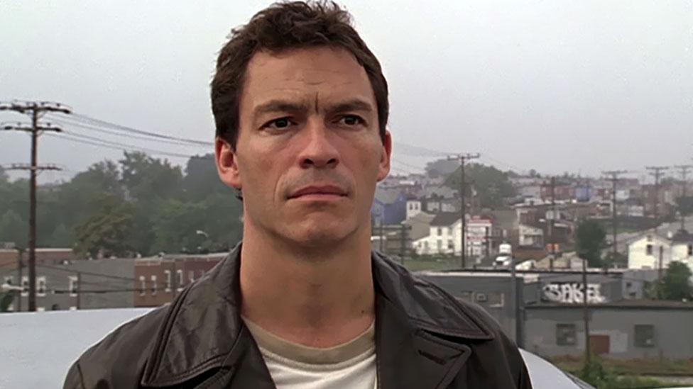 Jimmy McNulty is the troubled central detective in The Wire. Despite his faults – alcoholism, arrogance, infidelity – he's dedicated to challenging a corrupt system. (Photo: HBO) Jimmy McNulty is the troubled central detective in The Wire. Despite his faults – alcoholism, arrogance, infidelity – he's dedicated to challenging a corrupt system. (Photo: HBO)