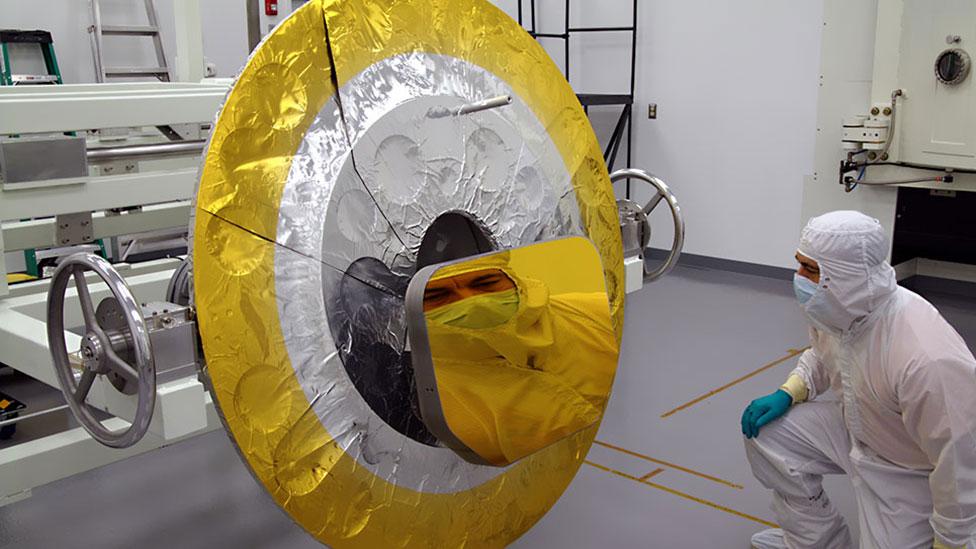 The secondary mirror will, in turn, reflect the light into a third mirror, and then onto one of four main cameras. (Copyright: Ball Aerospace/Quantum Coating Incorporated) The secondary mirror will, in turn, reflect the light into a third mirror, and then onto one of four main cameras. (Copyright: Ball Aerospace/Quantum Coating Incorporated)