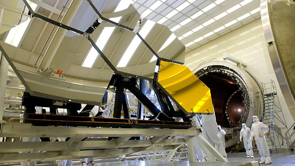 The segments of the mirror will fold up, like the leaves of a drop-leaf table, so that it can fit into a rocket, and then unfold after launch. (Copyright: Nasa) The segments of the mirror will fold up, like the leaves of a drop-leaf table, so that it can fit into a rocket, and then unfold after launch. (Copyright: Nasa)