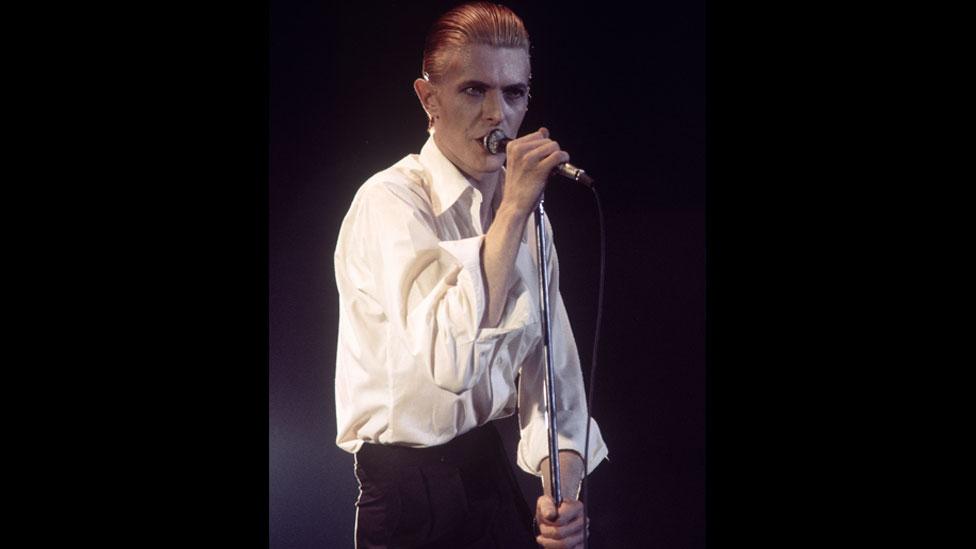 David Bowie is captured on the Station to Station tour in 1976, where he introduced his new Thin White Duke persona. (Rex Features) David Bowie is captured on the Station to Station tour in 1976, where he introduced his new Thin White Duke persona. (Rex Features)