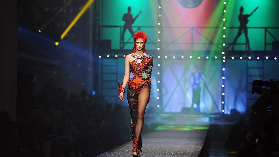 Jean-Paul Gaultier cited David Bowie as an inspiration for his Paris Spring/Summer 2013 show, sending Bowie lookalikes down the runway. (Getty Images) Jean-Paul Gaultier cited David Bowie as an inspiration for his Paris Spring/Summer 2013 show, sending Bowie lookalikes down the runway. (Getty Images)