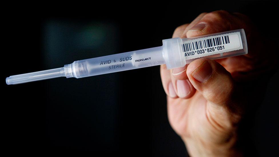 At a recent conference in San Francisco, people paid $50 to be chipped with a needle device like this one. (Reuters/Edgard Garrido) At a recent conference in San Francisco, people paid $50 to be chipped with a needle device like this one. (Reuters/Edgard Garrido)