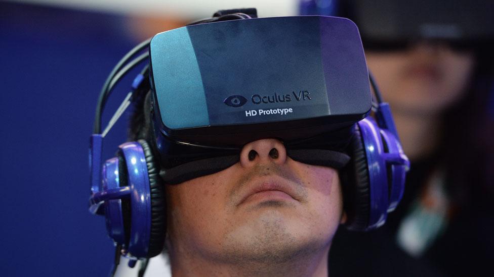 The Oculus Rift virtual reality device displaying a multiplayer dog-fighting shooter game (Robyn Beck/AFP/Getty Images) The Oculus Rift virtual reality device displaying a multiplayer dog-fighting shooter game (Robyn Beck/AFP/Getty Images)