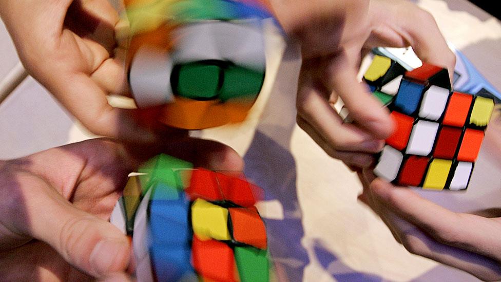 Speedcubers try to solve Rubik’s Cubes as quickly as possible, sometimes in organised tournaments. The current record is 5.55 seconds. (Karoly Arvai/Reuters/Corbis) Speedcubers try to solve Rubik’s Cubes as quickly as possible, sometimes in organised tournaments. The current record is 5.55 seconds. (Karoly Arvai/Reuters/Corbis)