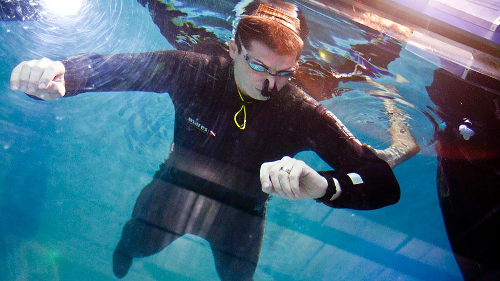 Pete Colat is a four-time record holder for breath-holding (without swimming), preparing by breathing pure oxygen for up to 30 minutes before submerging. (EPA/Ennio Leanza) Pete Colat is a four-time record holder for breath-holding (without swimming), preparing by breathing pure oxygen for up to 30 minutes before submerging. (EPA/Ennio Leanza)