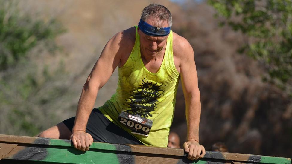 The author used his down time to compete in an obstacle race. (Credit: Copyright Souvenir Photograph) The author used his down time to compete in an obstacle race. (Credit: Copyright Souvenir Photograph)