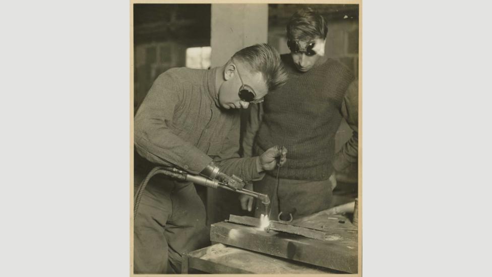 Post-WWI, new prosthetics allowed people to perform previously impossible tasks, like welding or driving a car (Credit: National Museum of Health and Medicine CC BY 2.0/Flickr) Post-WWI, new prosthetics allowed people to perform previously impossible tasks, like welding or driving a car (Credit: National Museum of Health and Medicine CC BY 2.0/Flickr)