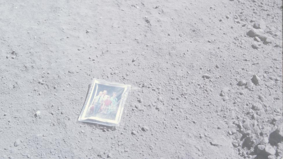 This family portrait deposited by Apollo 16’s Charles Duke still lies where it was left, but is probably now completely bleached (Credit: Nasa) This family portrait deposited by Apollo 16’s Charles Duke still lies where it was left, but is probably now completely bleached (Credit: Nasa)