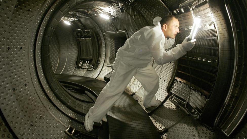 A worker inside a plasma heating system in a more traditional government-funded fusion reactor design (Credit: Getty Images) A worker inside a plasma heating system in a more traditional government-funded fusion reactor design (Credit: Getty Images)