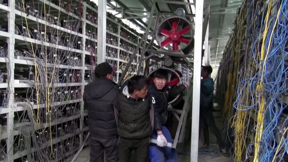 Hundreds of computers shelved on rows churn out about 50 bitcoins per day (Credit: Danny Vincent) Hundreds of computers shelved on rows churn out about 50 bitcoins per day (Credit: Danny Vincent)