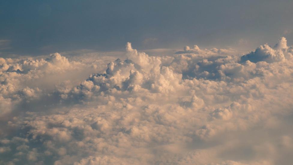 One method is to fly above the clouds and release rain-encouraging salts onto them (Credit: Getty Images) One method is to fly above the clouds and release rain-encouraging salts onto them (Credit: Getty Images)