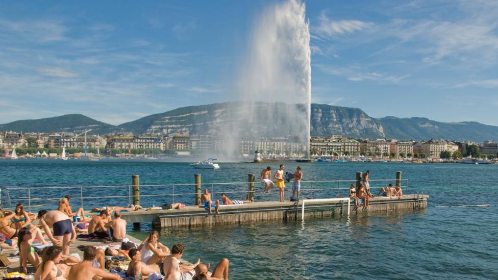 Lakeside sunbathing, Geneva, locals spend much of their leisure time relaxing here or doing water sports (Credit: Alamy) Lakeside sunbathing, Geneva, locals spend much of their leisure time relaxing here or doing water sports (Credit: Alamy)