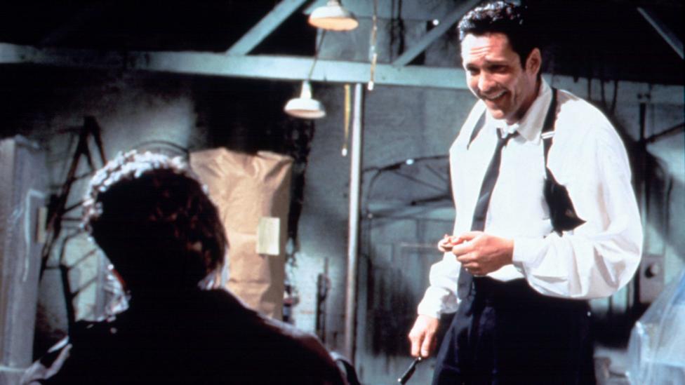 It’s still chilling to see the psychopathic Mr Blonde (Michael Madsen) slashing a policeman’s face and severing his ear (Credit: Moviestore Collection Ltd / Alamy Stock Photo) It’s still chilling to see the psychopathic Mr Blonde (Michael Madsen) slashing a policeman’s face and severing his ear (Credit: Moviestore Collection Ltd / Alamy Stock Photo)