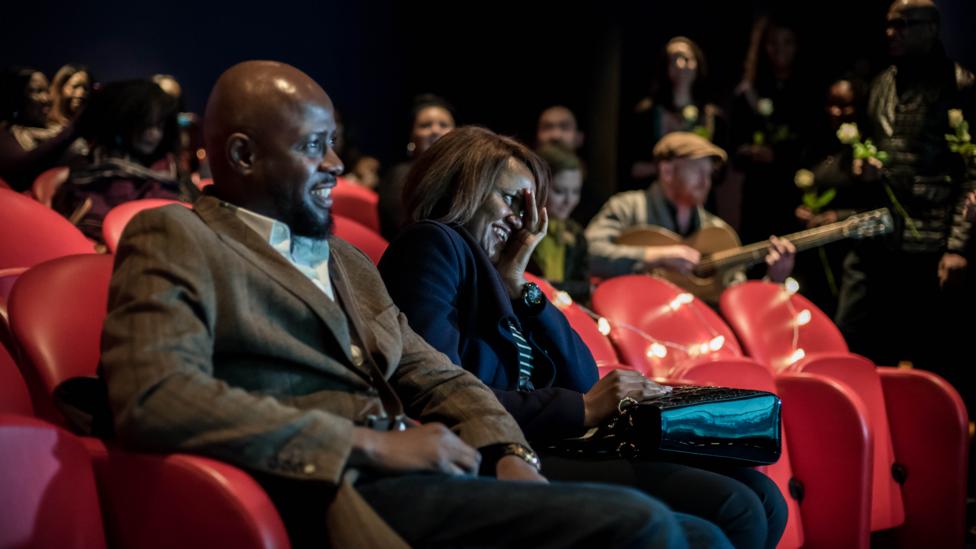 Anthony Williams and Dembi Anthony-Williams at their cinema flash mob proposal in London, arranged by The One Romance in March 2016 (Credit: Sandra Reddin photography) Anthony Williams and Dembi Anthony-Williams at their cinema flash mob proposal in London, arranged by The One Romance in March 2016 (Credit: Sandra Reddin photography)