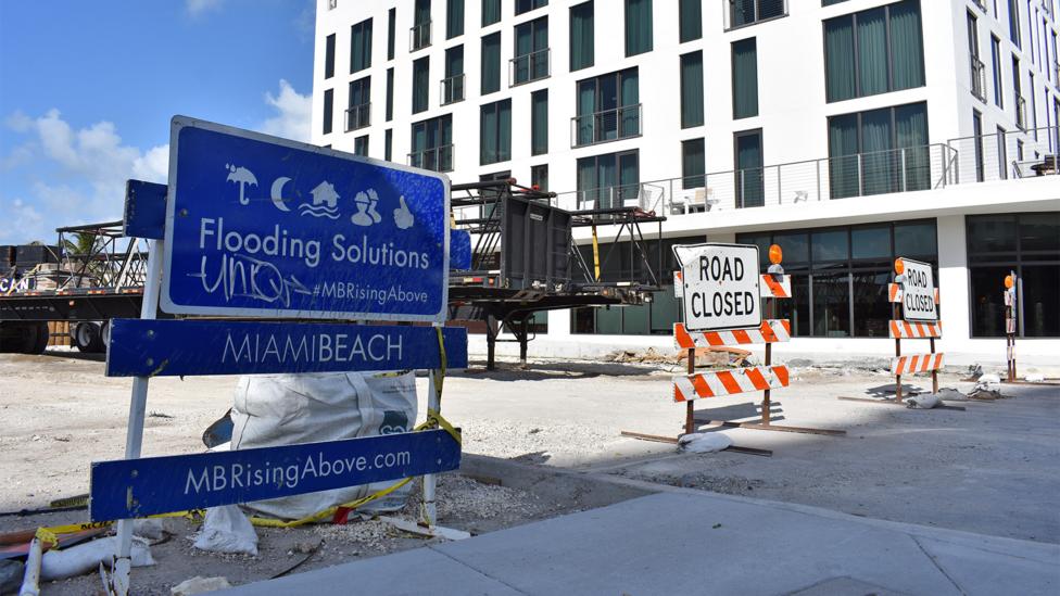 Signs like these have become ubiquitous in Miami Beach, where officials are determined to fight flooding and have launched a multi-pronged plan (Credit: Amanda Ruggeri) Signs like these have become ubiquitous in Miami Beach, where officials are determined to fight flooding and have launched a multi-pronged plan (Credit: Amanda Ruggeri)