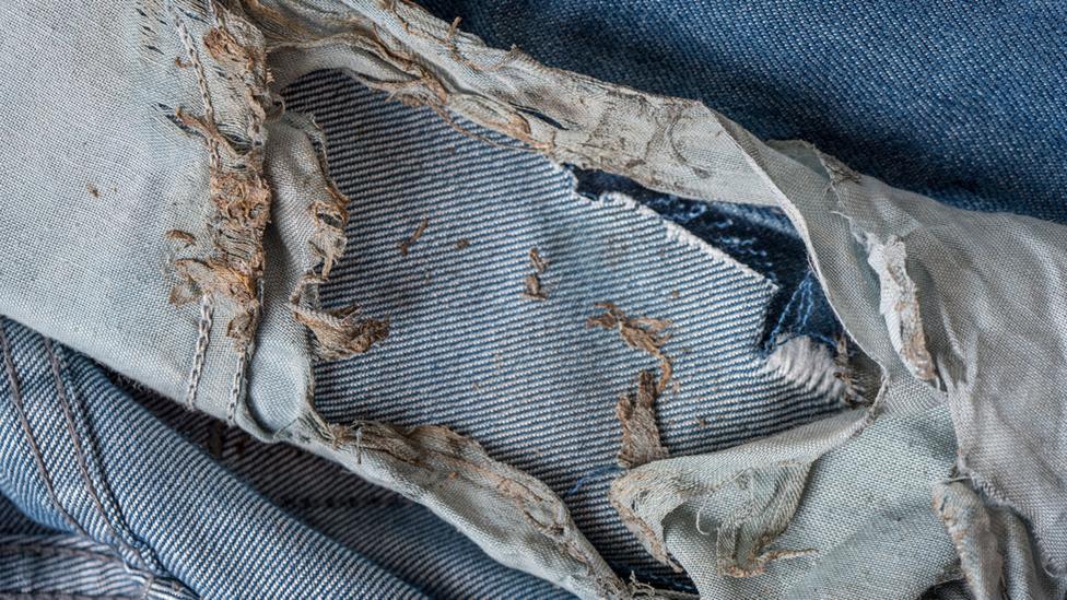 Singed denim worn by Jaime Santana when he was struck (Credit: William LeGoulon) Singed denim worn by Jaime Santana when he was struck (Credit: William LeGoulon)