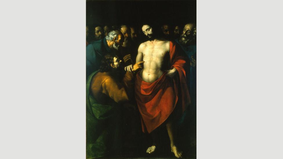 In López de Arteaga’s undated work The Incredulity of Saint Thomas, the red smock worn by Christ, denoting his holiness, pops off the canvas (Credit: Wikimedia) In López de Arteaga’s undated work The Incredulity of Saint Thomas, the red smock worn by Christ, denoting his holiness, pops off the canvas (Credit: Wikimedia)