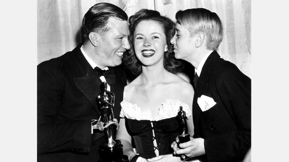 Winners of the Juvenile Academy Award, such as Claude Jarman Jr, right, received a smaller statuette – Harold Russell, left, is the only winner to sell his Oscar (Credit: Alamy) Winners of the Juvenile Academy Award, such as Claude Jarman Jr, right, received a smaller statuette – Harold Russell, left, is the only winner to sell his Oscar (Credit: Alamy)
