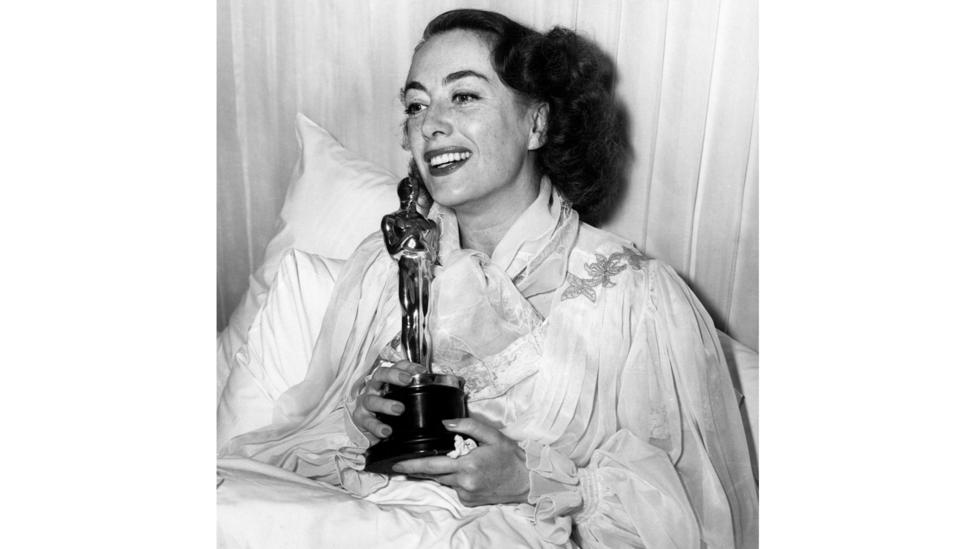 It’s believed that Joan Crawford feigned illness to avoid attending the Oscars ceremony in 1946 because she thought she’d lose best actress – but she won (Credit: Alamy) It’s believed that Joan Crawford feigned illness to avoid attending the Oscars ceremony in 1946 because she thought she’d lose best actress – but she won (Credit: Alamy)
