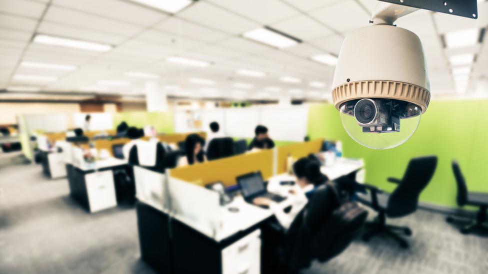 Some firms use cameras and Bluetooth infrared sensors to detect how many people are working in one particular part of an office and how they move around (Credit: Getty Images) Some firms use cameras and Bluetooth infrared sensors to detect how many people are working in one particular part of an office and how they move around (Credit: Getty Images)