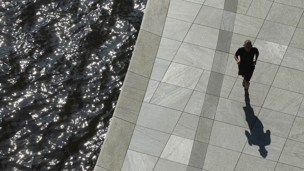 A jogger runs along the Spree river near the Bundestag in Berlin, Germany (Credit: Getty Images) A jogger runs along the Spree river near the Bundestag in Berlin, Germany (Credit: Getty Images)