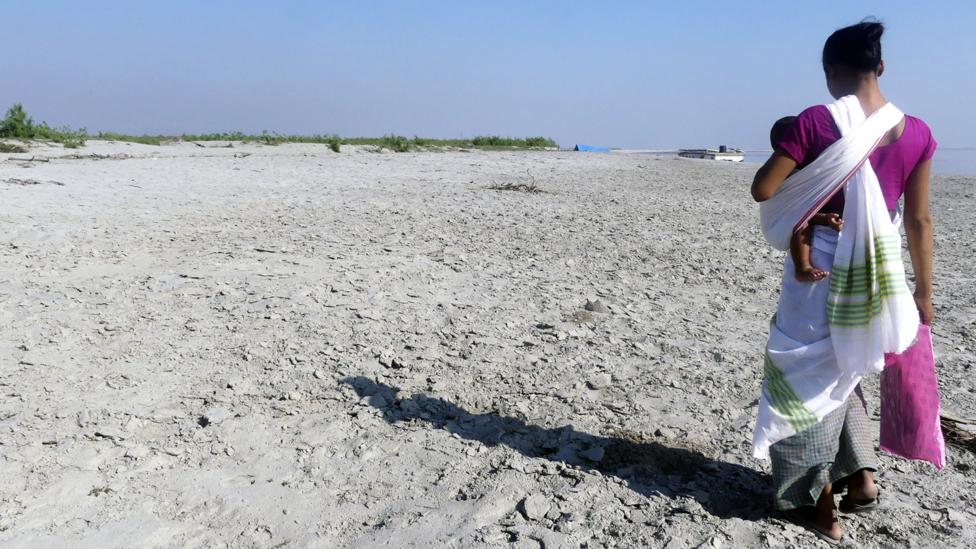 Some 2.5 million people call the islands in India's Brahmaputra River home (Credit: Jules Montague) Some 2.5 million people call the islands in India's Brahmaputra River home (Credit: Jules Montague)