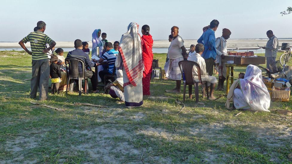 The islanders come to receive care from the medics (Credit: Jules Montague) The islanders come to receive care from the medics (Credit: Jules Montague)