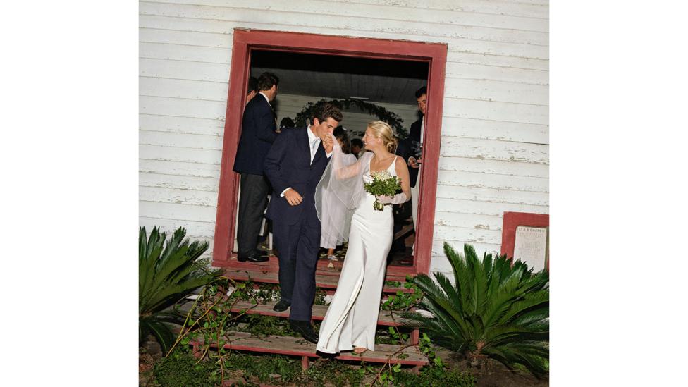 In the past Meghan has enthused about Carolyn Bessette Kennedy’s simple, slinky bridal dress, but for a royal wedding this look would be too informal (Credit: Denis Reggie) In the past Meghan has enthused about Carolyn Bessette Kennedy’s simple, slinky bridal dress, but for a royal wedding this look would be too informal (Credit: Denis Reggie)