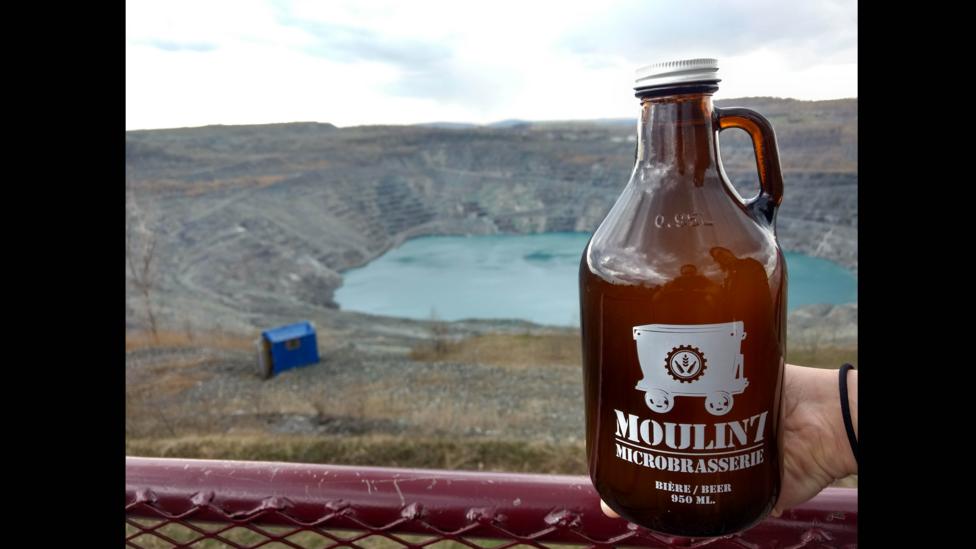 One of the beers produced by the Moulin 7 Microbrewery uses water that has accumulated at the bottom of the open cast asbestos mine (Credit: Lorcan Archer) One of the beers produced by the Moulin 7 Microbrewery uses water that has accumulated at the bottom of the open cast asbestos mine (Credit: Lorcan Archer)