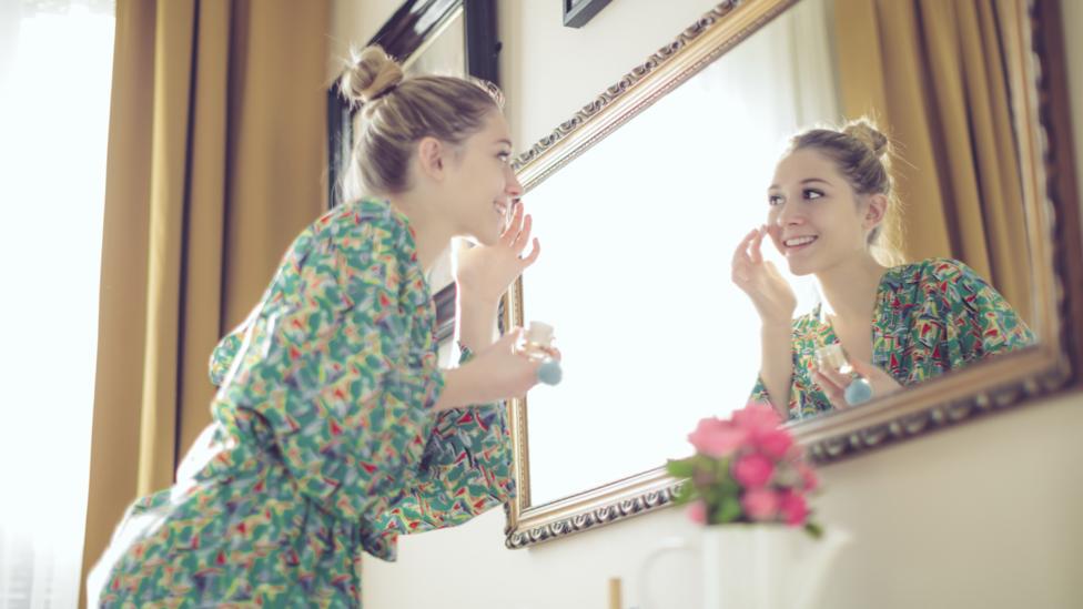 While some people swear by face moisturisers as a way of holding back the signs of time, it might be cheaper to wear a silver mask (Credit: Getty Images) While some people swear by face moisturisers as a way of holding back the signs of time, it might be cheaper to wear a silver mask (Credit: Getty Images)