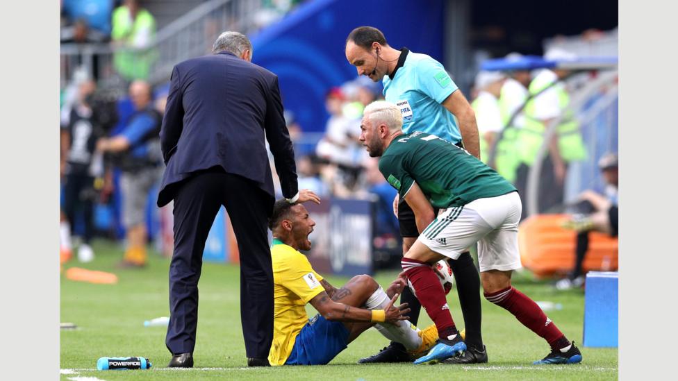 Miguel Layún of Mexico collects the ball as Neymar of Brazil goes down injured during the round of 16 match between Brazil and Mexico on 2 July (Credit: Getty Images) Miguel Layún of Mexico collects the ball as Neymar of Brazil goes down injured during the round of 16 match between Brazil and Mexico on 2 July (Credit: Getty Images)