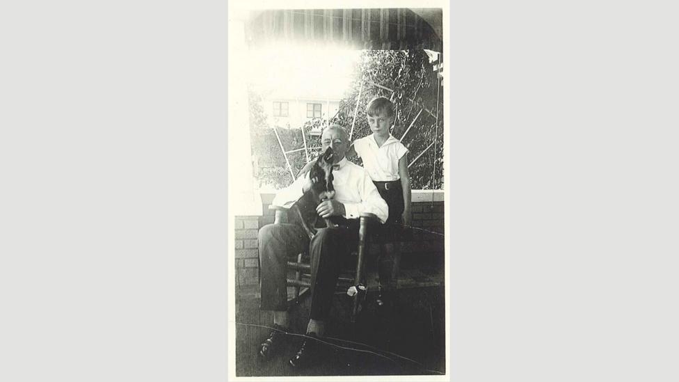 Gorey, aged seven, in Bradenton, Florida, with his maternal grandfather, Benjamin S Garvey, December 1932 (Credit: Elizabeth Morton, private collection) Gorey, aged seven, in Bradenton, Florida, with his maternal grandfather, Benjamin S Garvey, December 1932 (Credit: Elizabeth Morton, private collection)