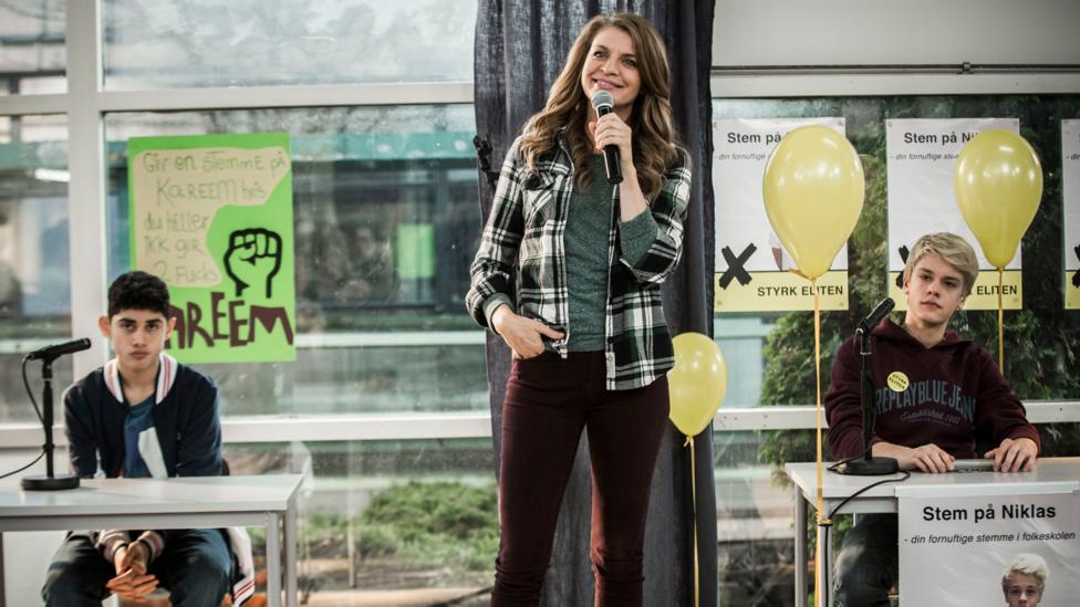 Rita is distinctive with her long hair, leather jacket and endless selection of plaid shirts (Credit: Per Arnesen / TV 2) Rita is distinctive with her long hair, leather jacket and endless selection of plaid shirts (Credit: Per Arnesen / TV 2)