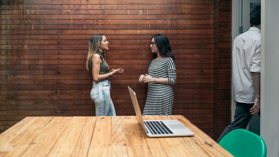 Chatting with colleagues, even briefly, might lower stress and boost attention at work (Credit: Getty Images) Chatting with colleagues, even briefly, might lower stress and boost attention at work (Credit: Getty Images)