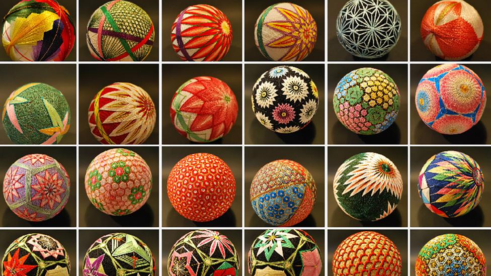 A selection of colourful thread wrapped balls A selection of colourful thread wrapped balls