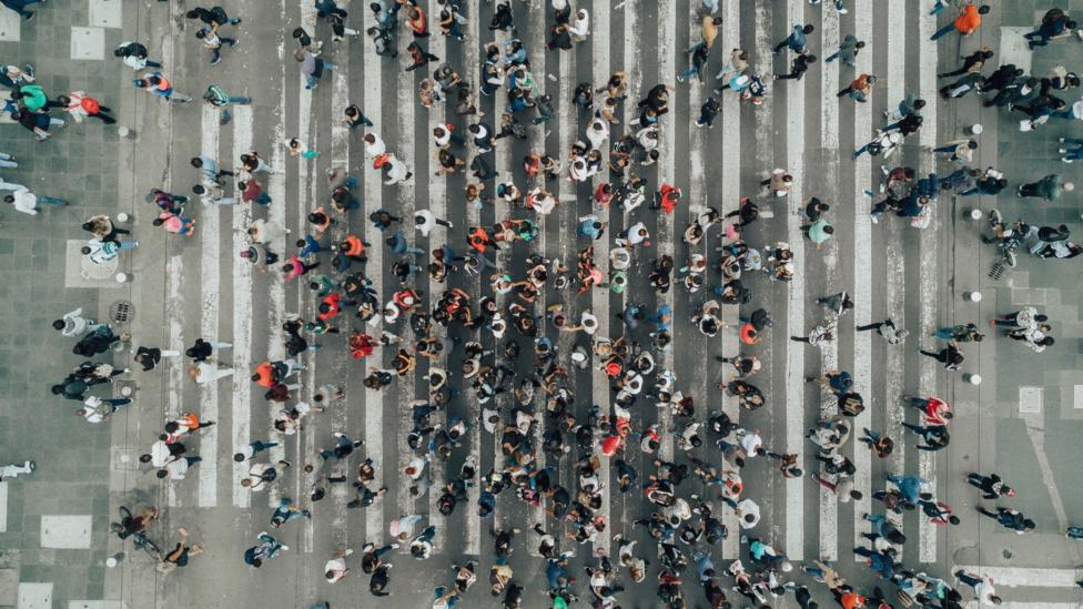 People crossing street in Mexico City. People crossing street in Mexico City.