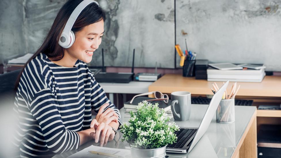 Some scientists think music doesn't make us more productive, but rather, we convince ourselves of it because it's a gift from our employers (Credit: Alamy) Some scientists think music doesn't make us more productive, but rather, we convince ourselves of it because it's a gift from our employers (Credit: Alamy)